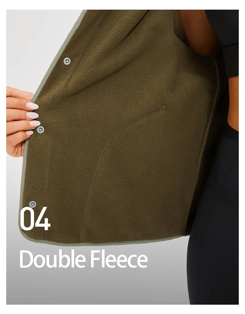 Person showcasing the interior of a green jacket, highlighting the double fleece design, adding warmth and comfort for winter running.